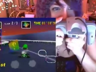 Geek mistress cums playing Mario Kart